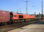 Die Class 66 DE6312  Alix  von Crossrail. Sie fährt viel Dieselpower mit einem Containerzug aus Milano(I) nach Zeebrugge-Ramskapelle(B) in Richtung Belgien. Aufgenommen vom Bahnsteig in Aachen-West.
Bei schönem Sonnenschein am Mittag vom 27.2.2016. 