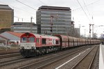 HGK DE671 Class 66 mit einem Kohlezug in Düsseldorf Rath, am 23.03.2016.