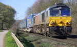 Die Class 66 DE6309 von DLC Railways kommt die Gemmenicher-Rampe herunter nach Aachen-West mit einem langen LKW-Walter-Zug aus Genk-Goederen(B) nach Novara(I) Aufgenommen an der Montzenroute am