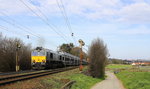 Die Class 66 DE6306 von DLC Railways kommt mit viel Dieselpower die Gemmenicher-Rampe hochgefahren aus Richtung Aachen-West in Richtung Montzen/Belgien mit einem langen  Hyundai-Autozug aus Polen nach