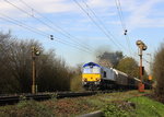 Die Class 66 266 026-4 von Railtraxx kommt aus Richtung Aachen-West und fährt die Gemmenicher-Rampe hoch mit einem schweren Coilzug aus Linz Voestalpine(A) nach Antwerpen-Waaslandhaven(B). 
Aufgenommen an der Montzenroute am Gemmenicher-Weg. 
Bei schönem Frühlingswetter am Nachmittag vom 21.4.2016.