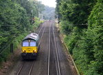 Die Class 66 PB18 von der Rurtalbahn-Cargo kommt als Lokzug aus Aachen-West nach Oberhausen-West und kommt durch Kohlscheid und fährt in Richtung Herzogenrath,Mönchengladbach.