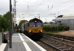 Die Class 66 266 035-5 von Railtraxx kommt als Umleiter mit einem Containerzug aus Köln-Eifeltor(D) nach Genk-Haven(B) und fährt durch Kohlscheid aus Richtung Herzogenrath und fährt die