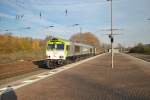 Am 20.11.2011 zieht Captrain 6606 (266 031-4) einen Schiebewandwagenzug durch Essen-Altenessen.