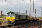 Ascendos/EGP 266 005 am 10.10.12 mit zwei Wagen bei der Durchfahrt durch Duisburg-Bissingheim.Der Zug hat sein Ziel Duisburg-Entenfang somit fast erreicht.