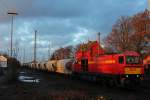 NDH Lok 9 am 18.12.13 mit einem Kalkwagenzug in Ratingen-Lintorf beim Halt.