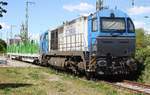 MaK G2000 / V1001-033 mit leerem Holzzug im Anschluss Binnenhafen Anklam am 13.05.2019. Aufnahme in der Hafenstrasse / Grünfläche. 