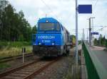 Vossloh G2000 der OHE mit einem Leerzug in Dollbergen