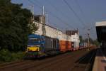 HGK 273 106-5 mit einem Containerzug in Dsseldorf-Vlklingerstrae am 04.07.2011