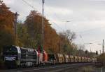 Die an RTS vermietete MRCE 500 1607 (272 406/ex RTB V201) zieht am 30.10.11 die RTS 293.002 und einen sehr langen Bauzug durch Ratingen-Lintorf.