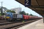 273 104, DH 753 der HGK, mit Erzwagenzug durch Kln West. Aufgenommen am 17.08.2012.