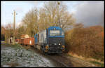 Lok 1041 G 2000 ist hier mit einem Schrottzug in Holzhausen auf der Georgs-Marien-Hütten Eisenbahn Strecke zum gleichnamigen Stahlwerk am 30.11.2016 um 9.31 Uhr unterwegs.