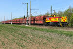 275 219-3 (Lok 210 | Vossloh G 1206) nördlich vom Bahnhof Großkorbetha  am 23.4.26 mit ein paar Schotterwagen am Hacken.
