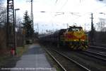 Eine MaK G 1206 von Eisenbahn und Hfen (547) fhrt am 11. Mrz 2009 mit einem Kohlezug durch Duisburg Enterfang