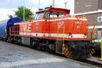 Eine Lok mit Wiedererkennungswert: In leuchtenden Orange prsentiert sich eine MaK G1206 am 10.06.2009 im HBf Gtersloh auf einem Nebengleis.