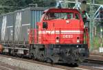 Die DE93 der HGK drchfahrt Kln West mit einem Gterzug am 13.07.2009
