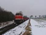 Lok 53 (G1206) der Westflische Landeseisenbahn (WLE) auf die Strecke der Teutoburger Wald-Eisenbahn mit Gterzug KC64222 von Hanekenfhr nach Paderborn bei Lienen am 21-2-2010.