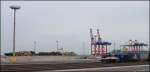 Der erste Containerzug am Jade-Weser-Port steht zur Erffnung mit der 275 503-1 der EVB bereit.Als leckerbissen ergab sich noch ein Blick auf die verbrannte MSC Flaminia.