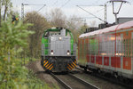 Leihlok 275 021 passiert zum Aufnahmezeitpunkt einen ET 425 der DB sowie den Haltepunkt Rheinhausen Ost.
