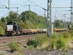G 1206 von Vossloh 275 620-3 (NVR-Nr: 92 80 1275 620-3 D-DISPO) mit einem Gleisbau  Schotterzug am 26.08.2016 bei Porta Westfalica Richtung Löhne unterwegs.