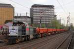 MRCE/RTS 275 624 am 2.4.14 mit einem RTS Schotterwagenzug in Düsseldorf-Rath.