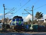 277 803-3 alias NIAG2 kommt mit Braunkohlestaubwagen durch Grevenbroich Richtung Rommerskirchen gefahren. 

Grevenbroich 09.03.2017