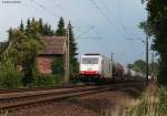 285 103-8 mit einem Kesselwagenzug gen Oldenburg bei Hude 17.8.10