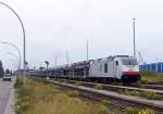 ITL 285-109-5 hat  am 28.9.2009 in Cuxhafen einen vollbeladenen Zug mit Importautos bespannt und wartet im  Hafenbahnhof auf Ausfahrt