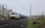 285 104 hier am 28.04.16 mit einem Kesselzug an der Schöpsdrehe (bei Plauen) im Schneesturm.