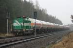 V 150-1 (LEW 16324) der PCK GmbH Schwedt auf dem Weg vom PCK zum Werkbahnhof Stendell. Bahnbergang Torfbruch-Heuallee 24.01.2011