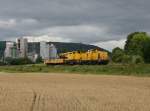 Die 710 966 mit einem Bauzug am 30.07.2011 unterwegs bei Karlstadt.