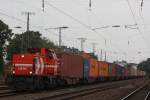 HGK DE 94 am 24.8.11 mit einem Containerzug bei der Durchfahrt durch Kln-West.