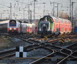 4746 053 als RE 9(76368)von Sassnitz nach Rostock Hbf bei der Einfahrt im Rostocker Hbf neben an kam zum richtigen Moment 650 114-8 raus.30.12.2019