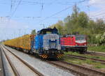 650 077 und Triangula 143 567-6 am 15.05.2026 in Rostock-Bramow.