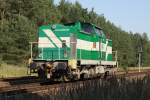 V 150-3 (LEW 16326) der PCK GmbH Schwedt auf dem Weg vom Werkbahnhof Stendell ins PCK. Bahnbergang Torfbruch-Heuallee 10.07.2010