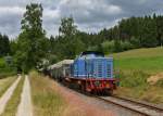 V65-12 (265 303) mit einem Schotterzug am 12.07.2013 bei Prnst.