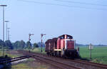 DB 290 393-8 mit 2 Stahlcoilwagen von Krefeld nach Kleve in Bedburg-Hau,  10.06.1997.