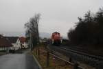 294 644-0 mht sich am 05.03.12 mit ihrem Kalizug Richtung Gerstungen in Widdershausen auf einer Steigung ab.