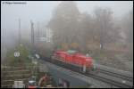 294 824-8 zieht am nebligen Morgen des 31.10.07 FZT 56087 von Aalen nach Giengen(Brenz), hier bei der Ausfahrt von Aalen.
