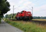 261 074-9 mit der 362 419-4 am Haken als kleiner Lokzug in Fahrtrichtung Norden. Aufgenommen bei Eystrup am 22.07.2014.