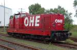 An einem bedeckten Juni Tag 2006 stand in Hamburg-Waltershof die damals von der OHE betriebene Lokomotive  120072 , gebaut 1960 von KHD mit der Fa.-Nr. 57101. Aber kann mir mal bitte jemand erklären, warum man die Lok als BR 423 eingereit hat (NVR-Nr.: 98 80 3 423 002) ?? Wäre eine Eingliederung in der BR 29x - Familie (NVR-Nr.: 98 80 3 29x xxx) nicht besser gewesen ?? Ich bin eigentlich immer davon ausgegangen, daß die BR 423 Elektrotriebzüge sind !! 