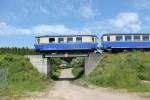 Unmittelbar vor der großen Weserbrücke bei Hoya überquert der T1 auf seinem Weg von Eystrup nach Bruchhausen-Vilsen noch einen Wirtschaftsweg (31.05.2014)