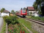 611 544 als RB 22717 von Friedrichshafen nach Lindau am 11.09.2011 zwischen Friedrichshafen und Eriskirch.