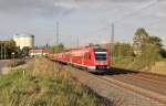 612 523 ist an dem Tag als Verstrker RE Richtung Gera unterwegs um die Pilgermassen wieder nach hause zu bringen;-)  Aufgenommen am 23.09.2011 am Ortsrand von Obernjesa