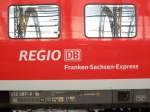 regio db franken - sachsen - express auf einem wagen des 612 das bedeutet fr reisende dresden hauptbahnhof - nrnberg hauptbahnhof.entstanden ist dieses bild am dresdener hauptbahnhof in den scheiben