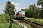 628 635 als RE nach Lbeck Hbf  am 21.07.2009 bei der Ausfahrt aus dem Kreuzungsbahnhof Menzendorf.Von Szczecin Głwny kommend, braucht er nach bereits ber 4 Stunden Fahrt noch etwa 30 Minuten