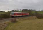 Auf seinem Weg von Seckach nach Miltenberg ist der 628 277 hier in der Landschaft bei Buchen zu sehen am Silvestertag 2012.