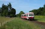 628 154 mit dem Moorexpress von Stade nach Bremen bei der Durchfahrt des Haltepunktes Brilit am 31.05.14.