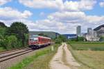 628 547 mit RB 22362 Ulm-HBF nach Ehingen an der Donau.Aufgenommen bei Schelklingen am 15.6.2014.Im Hintergrund die Heidelberger Zement Fabrik Schelklingen.