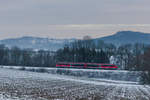 Unbekannter 642 als RE Hesental-Heilbronn am 11.01.2021 bei Neuenstein-Untereppach vor der leicht gepuderten Kulisse Waldenburgs.